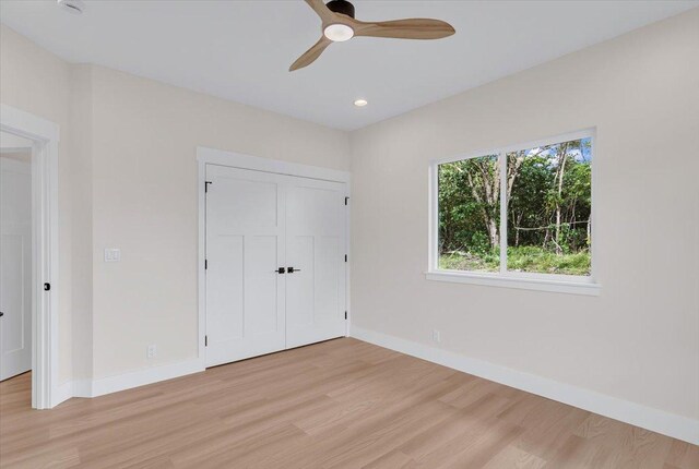 15-1616 7th Ave, Keaau, HI 96749 - unfurnished bedroom featuring light wood-style floors, baseboards, recessed lighting, a closet, and a ceiling fan