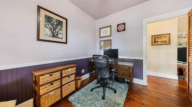 office area featuring wood finished floors and a wainscoted wall