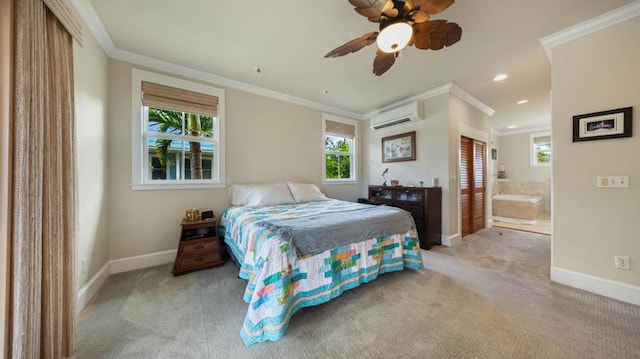 carpeted bedroom featuring ornamental molding, baseboards, connected bathroom, and a wall mounted air conditioner