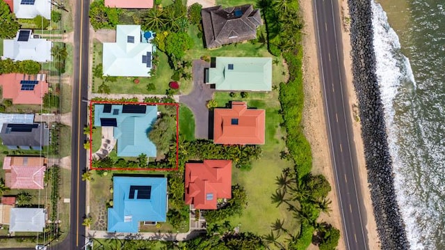 aerial view featuring a water view and a residential view