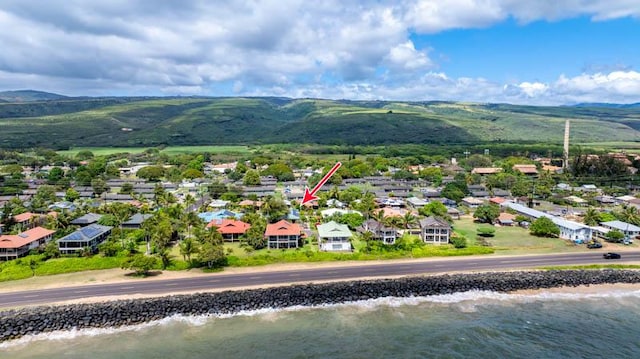 aerial view featuring a residential view and a water and mountain view