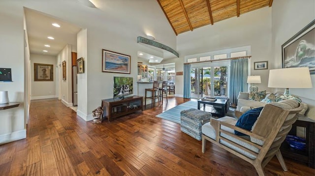 living room featuring hardwood / wood-style floors, wooden ceiling, and baseboards