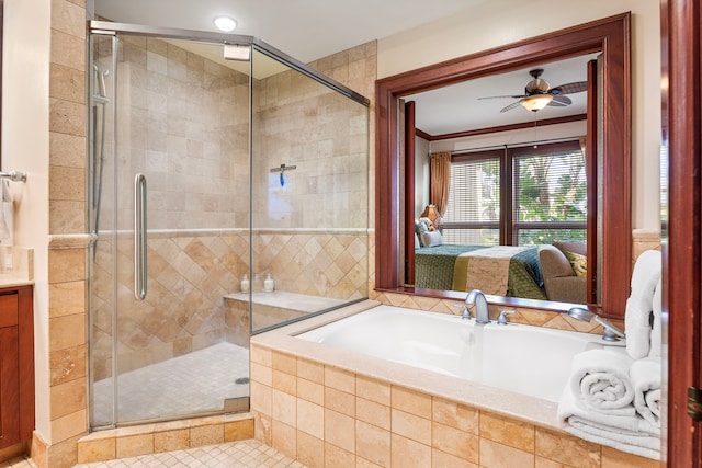 ensuite bathroom featuring a shower stall, ceiling fan, ensuite bathroom, a bath, and vanity