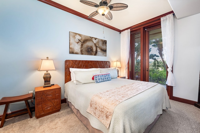bedroom featuring light colored carpet, a ceiling fan, ornamental molding, and baseboards