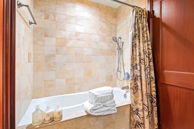 full bathroom featuring tiled shower / bath combo