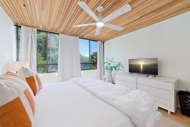 1875 Kalanianaole Ave Unit 311, Hilo, HI 96720 - bedroom with wooden ceiling, a ceiling fan, and light wood-style flooring