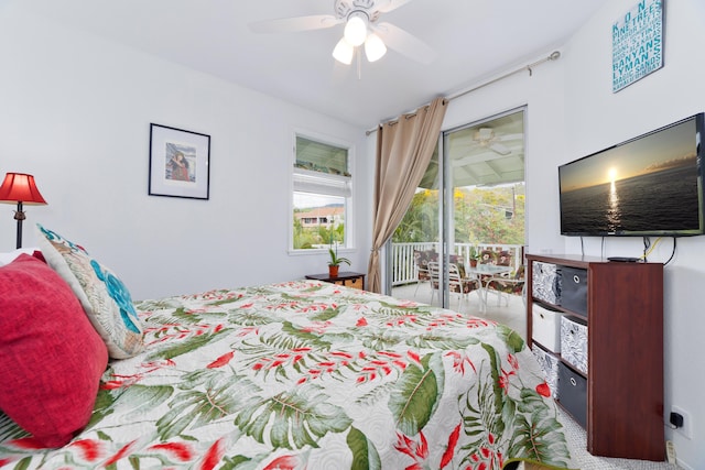 bedroom with ceiling fan and access to outside