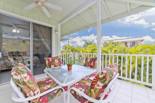 balcony featuring a ceiling fan and outdoor dining space