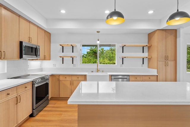 kitchen with stainless steel appliances, open shelves, a sink, light brown cabinets, and recessed lighting