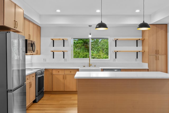 kitchen featuring stainless steel appliances, open shelves, a sink, light wood-style flooring, and recessed lighting