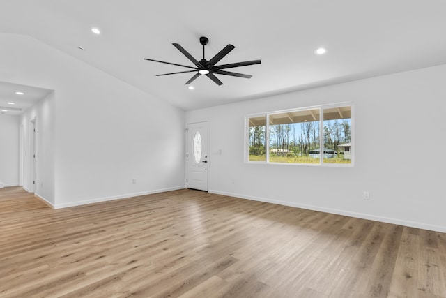 unfurnished living room with recessed lighting, ceiling fan, wood finished floors, and vaulted ceiling