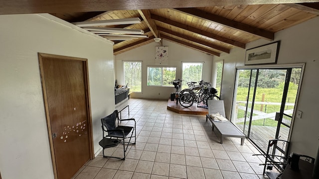 45-1181 Kalehua Rd, Honokaa, HI 96727 - living area with light tile patterned floors, lofted ceiling with beams, wooden ceiling, and baseboards