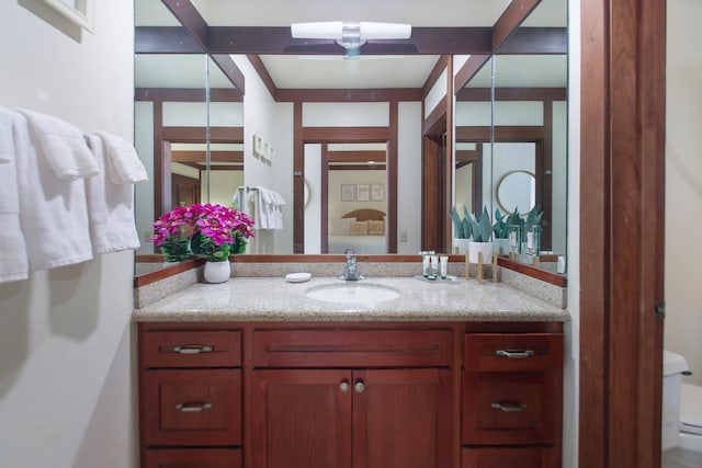 2253 Poipu Rd Unit 148, Koloa, HI 96756 - bathroom featuring vanity and toilet