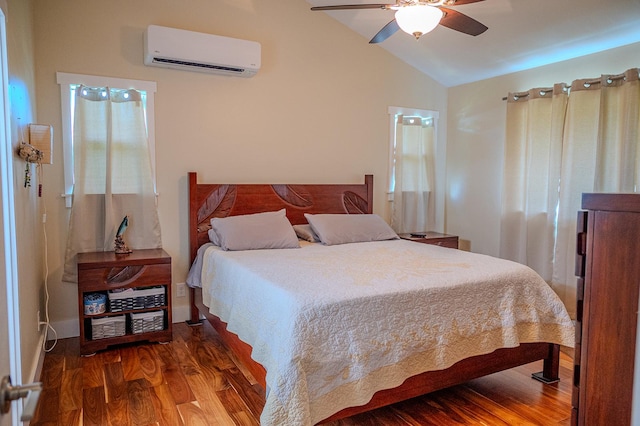 bedroom with a wall mounted air conditioner, ceiling fan, lofted ceiling, and wood finished floors