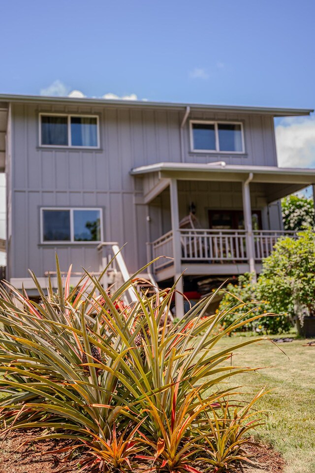 view of front facade with board and batten siding