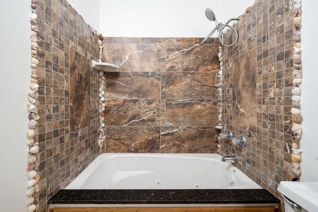 full bathroom featuring toilet and shower / bath combination