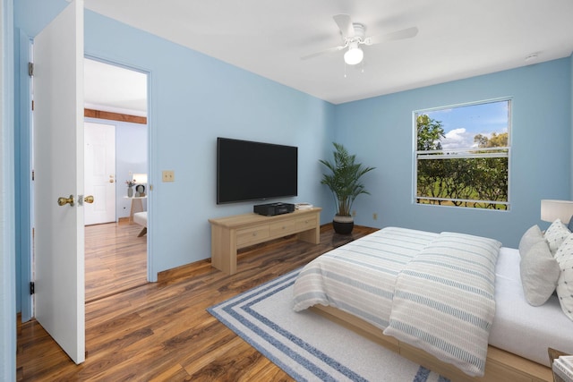 bedroom featuring a ceiling fan and wood finished floors