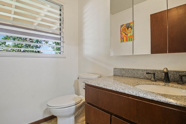 4013 Hoohana St, Lihue, HI 96766 - half bath featuring vanity, toilet, and baseboards
