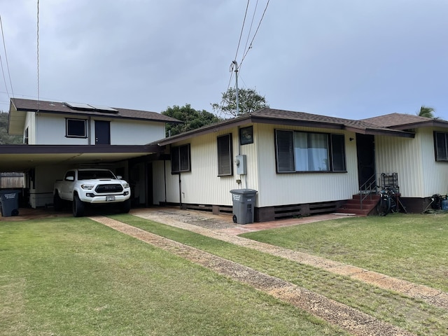 4013 Hoohana St, Lihue, HI 96766 - view of front of property featuring an attached carport, a front yard, driveway, and roof with shingles