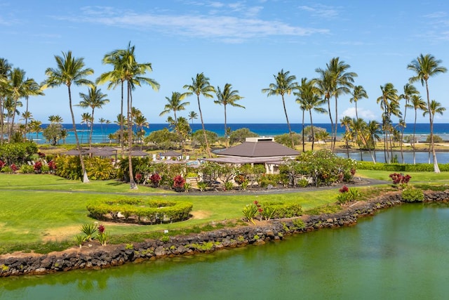 68-1399 Mauna Lani Dr Unit D301, Kamuela, HI 96743 - view of community featuring a water view and a lawn