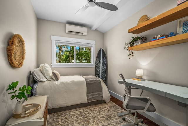 5413 Nakoa St, Koloa, HI 96756 - bedroom featuring a wall unit AC, an office area, wood finished floors, ceiling fan, and baseboards