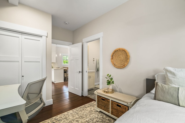 5413 Nakoa St, Koloa, HI 96756 - bedroom with dark wood-style floors, a closet, and connected bathroom