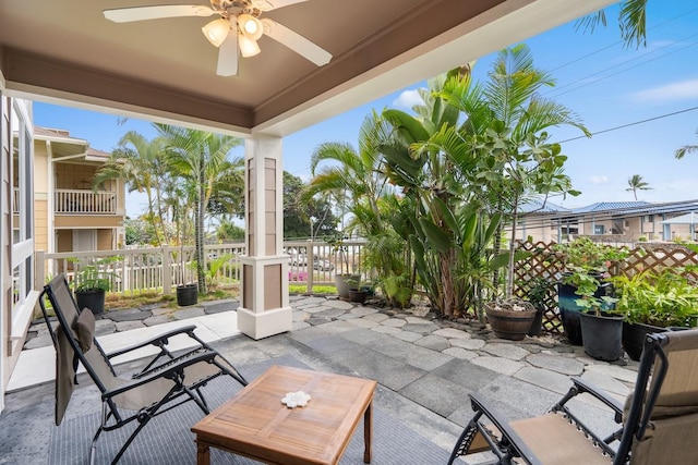 view of patio featuring ceiling fan