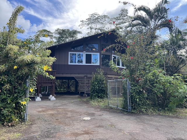 view of property exterior featuring driveway