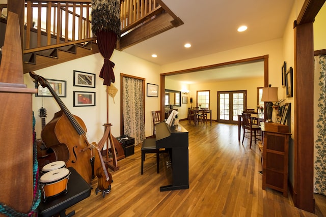 dining space featuring french doors, recessed lighting, and wood finished floors