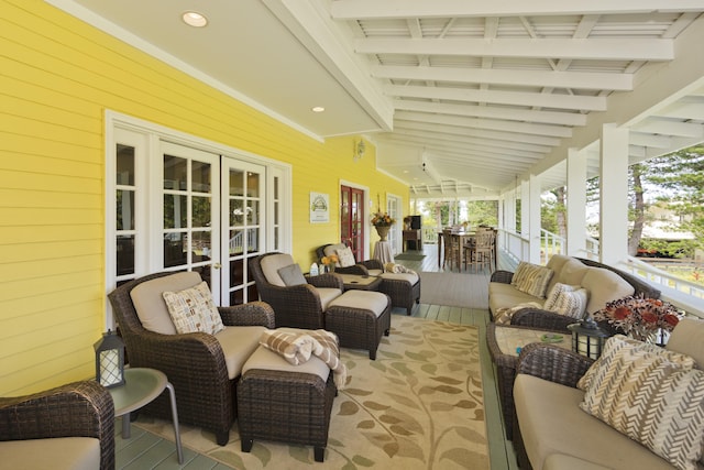 view of patio featuring an outdoor living space and french doors
