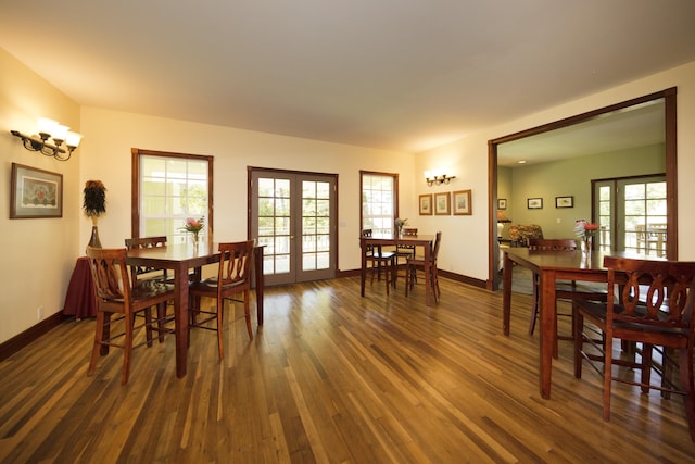 dining space featuring french doors, baseboards, and dark wood-style floors