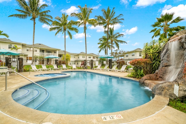 4771 Pepelani Lp Unit 411, Princeville, HI 96722 - pool with a residential view, a hot tub, a patio, and fence