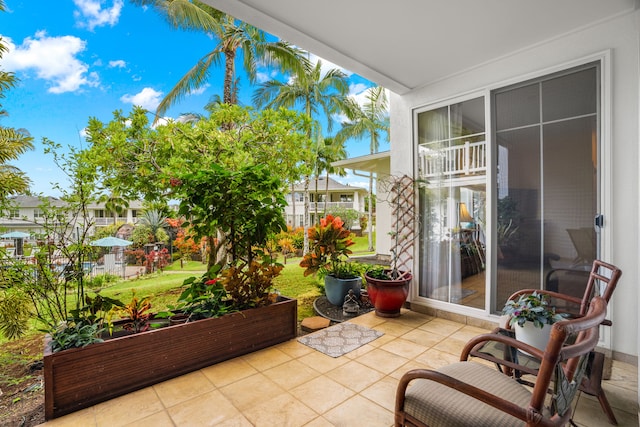 4771 Pepelani Lp Unit 411, Princeville, HI 96722 - balcony featuring a patio area