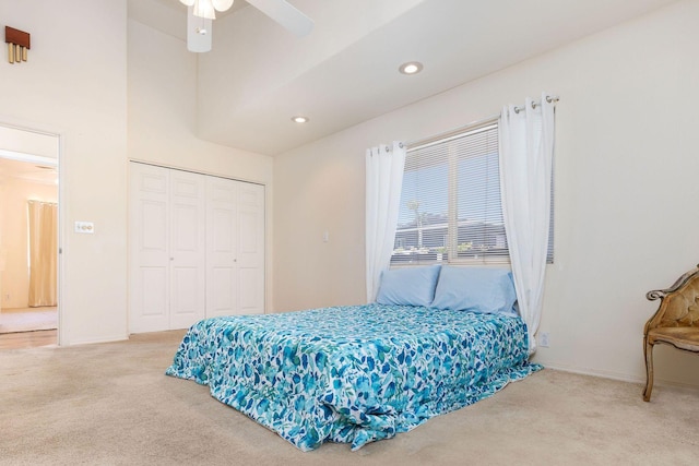 carpeted bedroom with a closet, a ceiling fan, baseboards, and recessed lighting