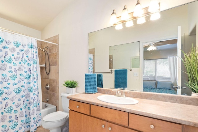 bathroom with toilet, vanity, ensuite bath, ceiling fan, and shower / bath combination with curtain