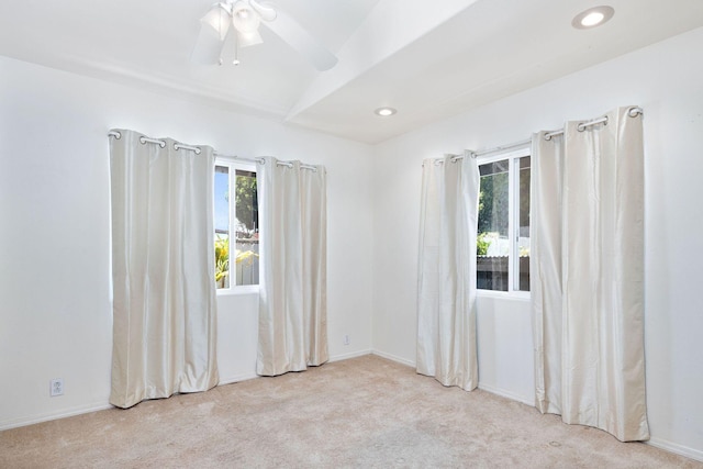carpeted spare room featuring ceiling fan, baseboards, and recessed lighting