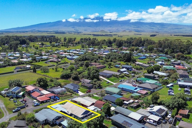 drone / aerial view featuring a mountain view and a residential view