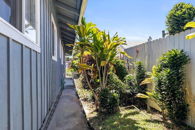 view of side of property with fence