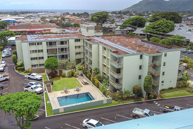birds eye view of property featuring a mountain view