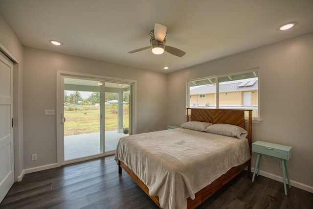 bedroom featuring baseboards, access to outside, and dark wood-type flooring