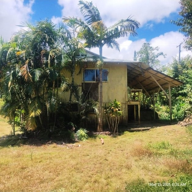 47-4724 Honokaa Waipio Rd, Honokaa, HI 96727 - back of house with a yard