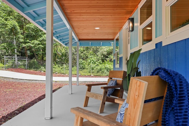view of patio featuring fence