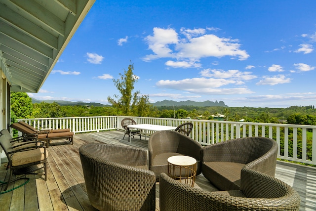 5366 Kumole St, Kapaa, HI 96746 - wooden terrace with a mountain view and outdoor dining area