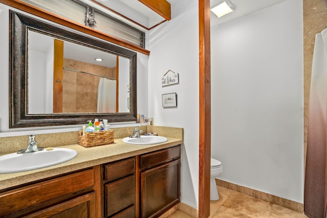 5366 Kumole St, Kapaa, HI 96746 - full bath featuring double vanity, toilet, baseboards, and a sink