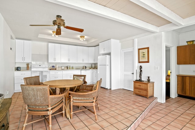 5366 Kumole St, Kapaa, HI 96746 - kitchen with white appliances, ceiling fan, light tile patterned floors, and light countertops