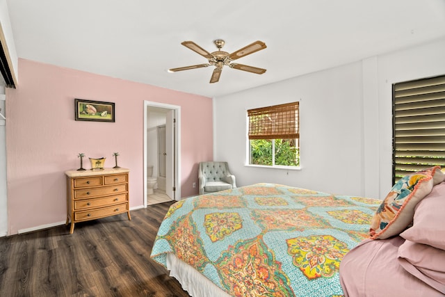 5366 Kumole St, Kapaa, HI 96746 - bedroom with baseboards, ceiling fan, ensuite bath, and dark wood-style floors