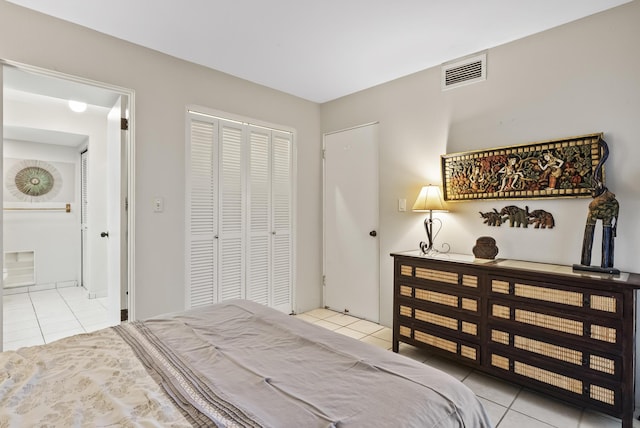 75-6082 Alii Dr Unit A103, Kailua-Kona, HI 96740 - tiled bedroom with a closet