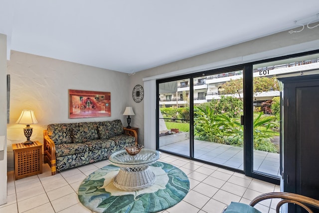 75-6082 Alii Dr Unit A103, Kailua-Kona, HI 96740 - living area featuring light tile patterned floors