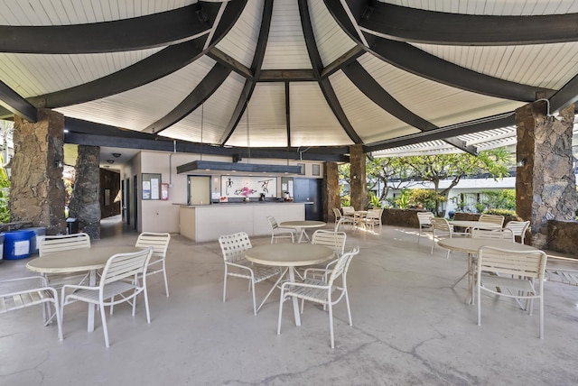 75-6082 Alii Dr Unit A103, Kailua-Kona, HI 96740 - view of patio / terrace featuring a gazebo and outdoor dining space