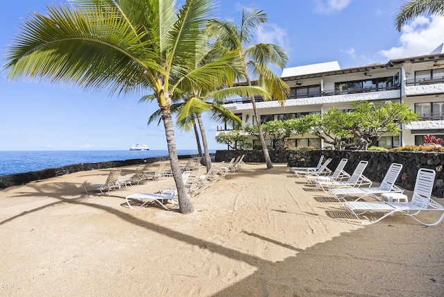 75-6082 Alii Dr Unit A103, Kailua-Kona, HI 96740 - view of patio / terrace featuring a water view